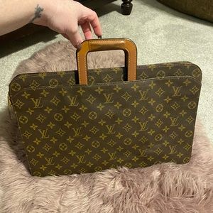 Authentic Vintage Louis Vuitton briefcase/document holder.